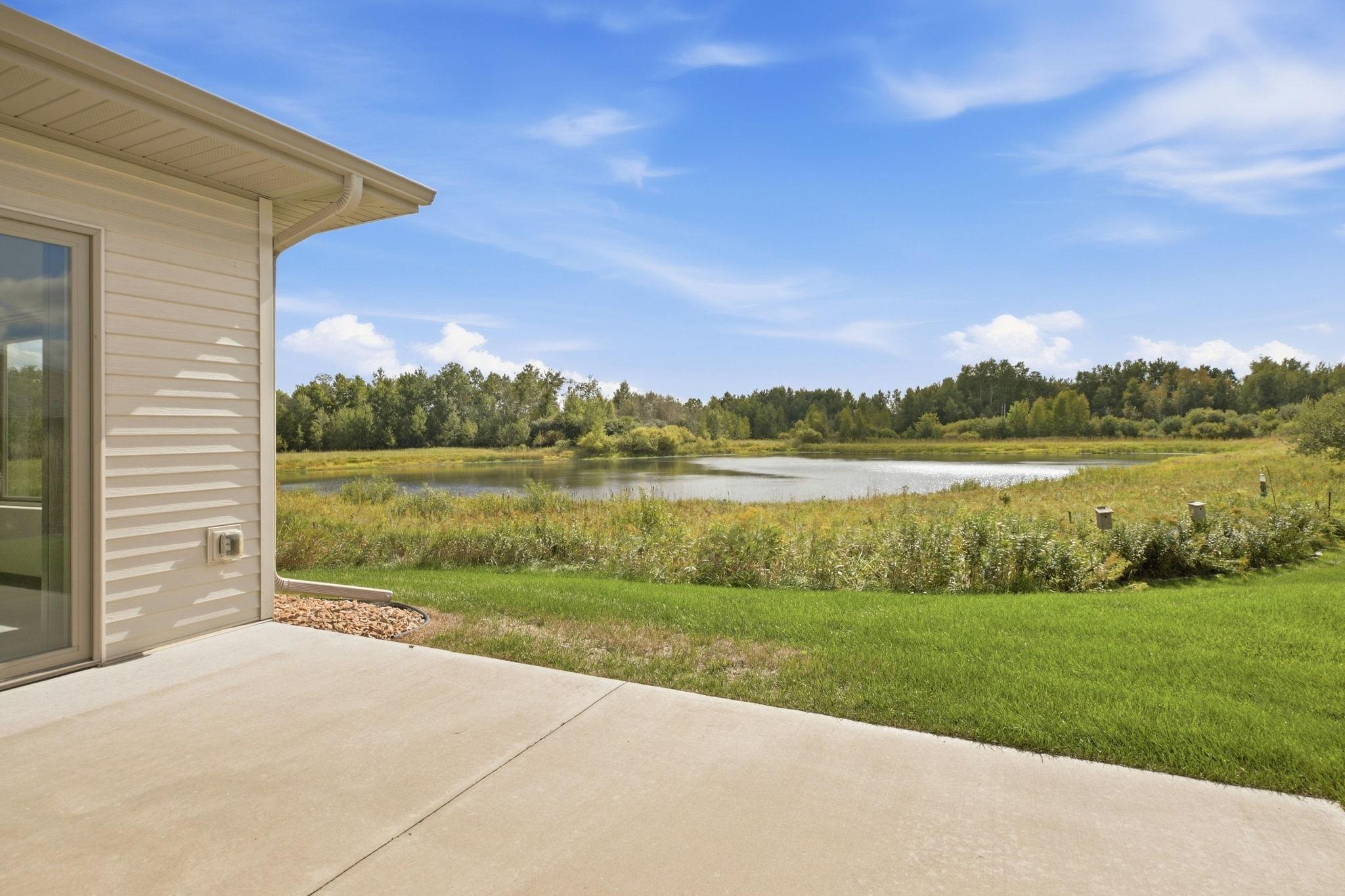 Privacy with Pond in Backyard