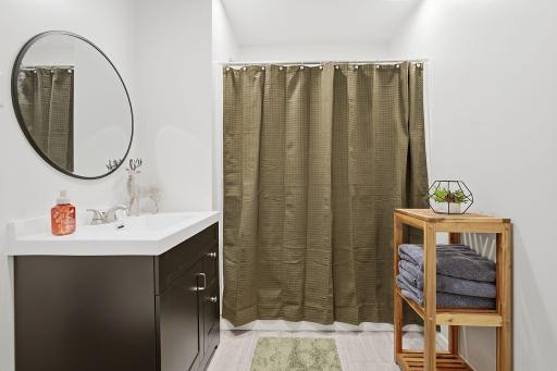 Brand new bath on main level has a walk-in shower.