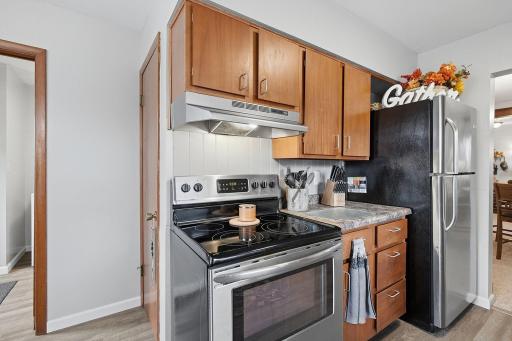 Convenient pantry in kitchen for added storage.