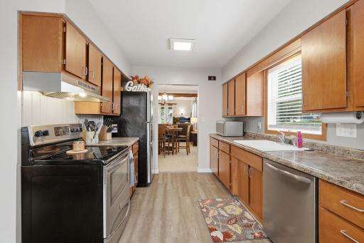 Newer stainless steel appliances anf flooring.