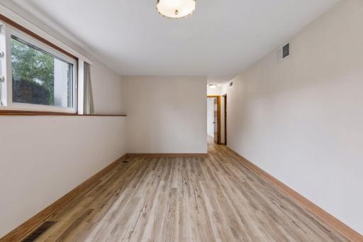 Lower level family-room with beautiful new flooring