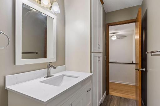 Refreshed main-level bath with plenty of storage