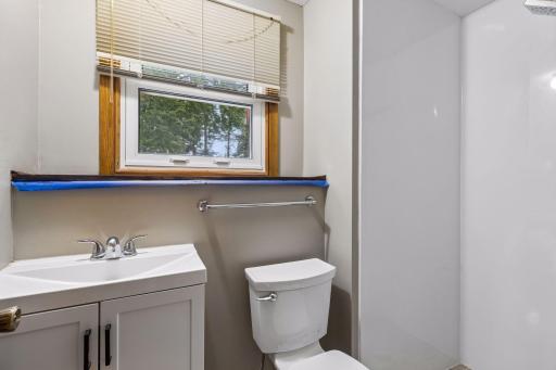 Convenient and refreshed lower-level 1/2 bath