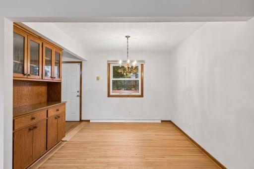 Hardwood floors continue into the dining area