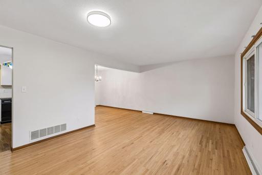 Open layout connects the living and dining areas