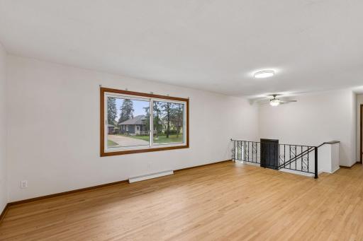 Bright living room overlooking the front yard