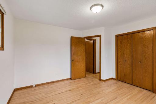 Second main-level bedroom with generous closet space