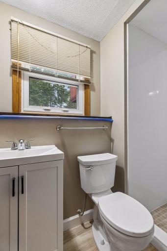 Convenient and refreshed lower-level 1/2 bath