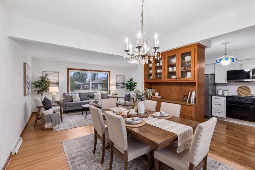 Virtually staged — dining and living areas
