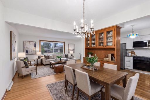 Virtually staged — living and dining spaces with lots of space