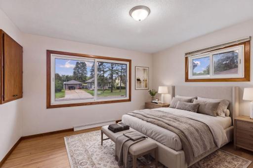 Virtually staged — main-level bedroom