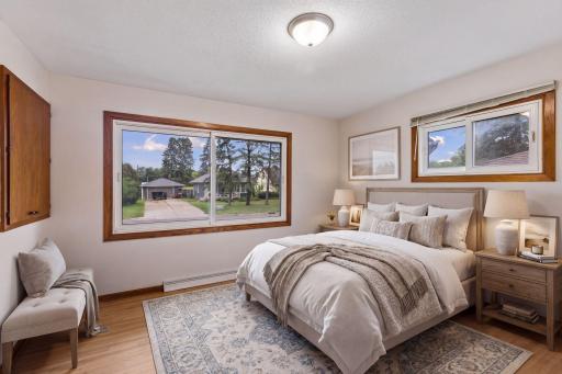 Virtually staged — main-level bedroom