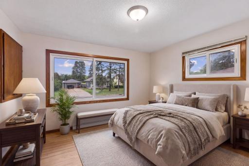 Virtually staged — main-level bedroom