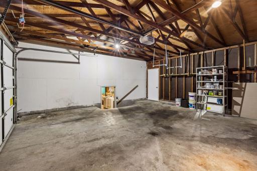 Spacious two-car garage with access to the house and backyard