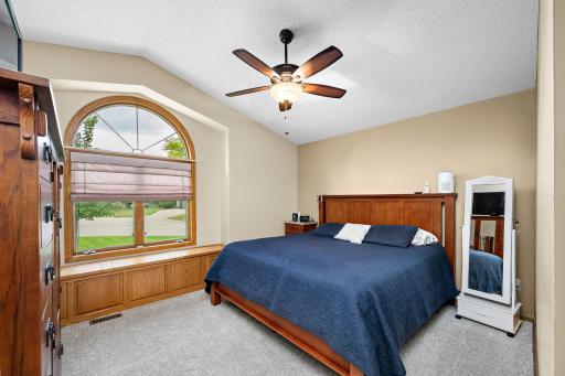 Owners suite bedroom with vaulted ceiling and so much more
