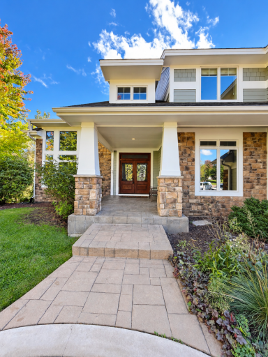 Curb appeal with large, covered entry and double doors