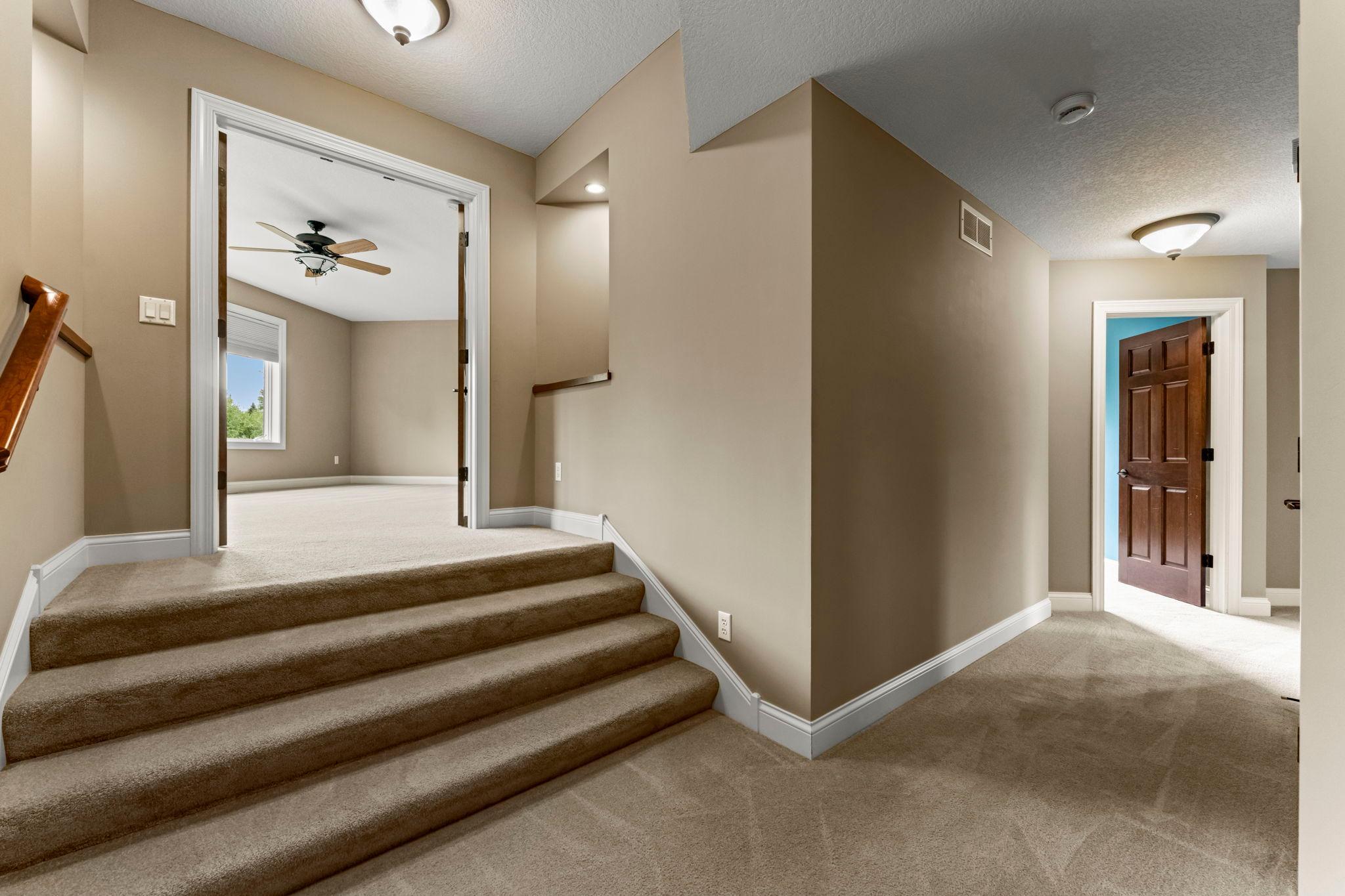 Stairs to large bonus room