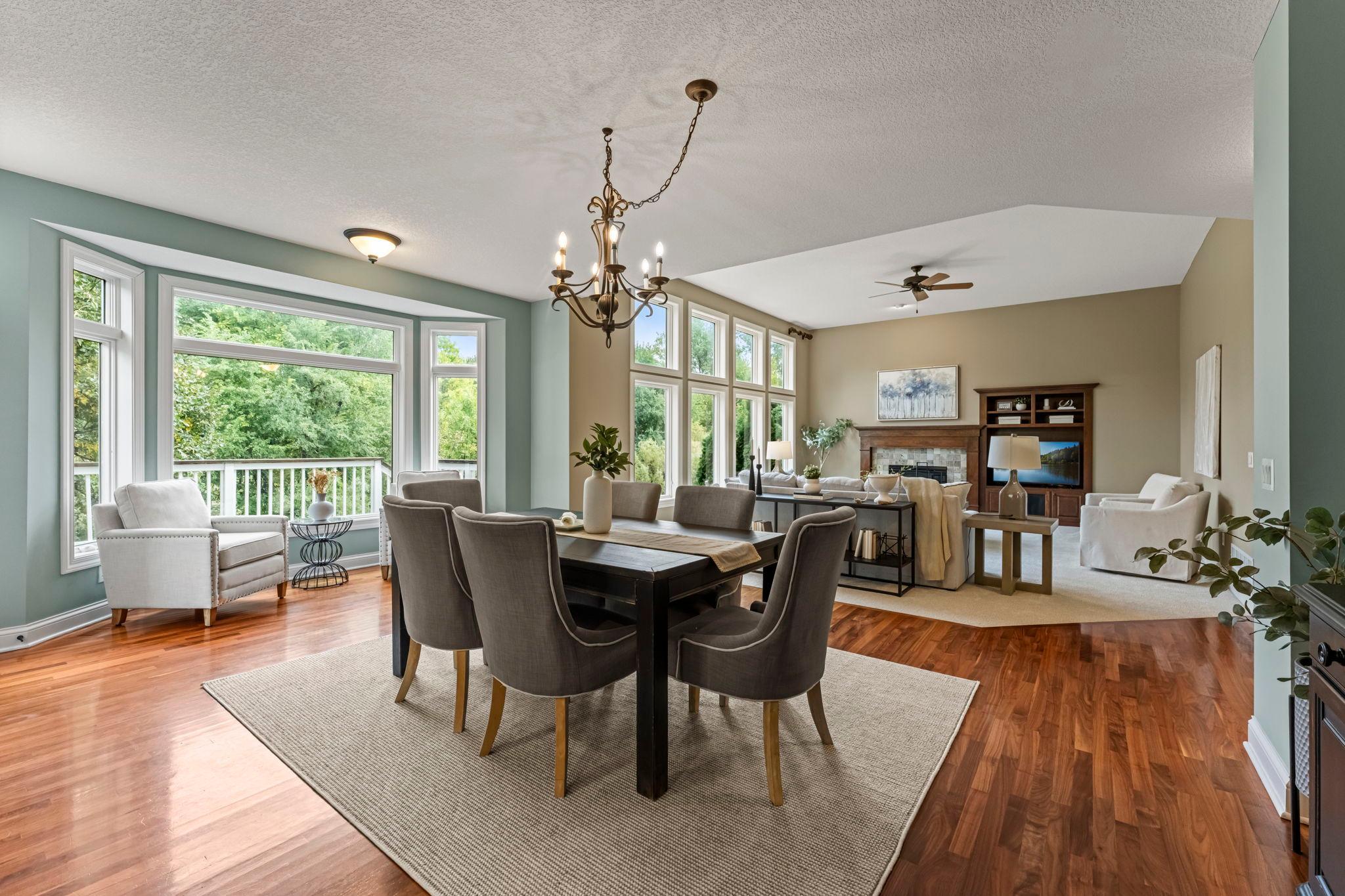 Open floorplan with walls of windows letting nature in