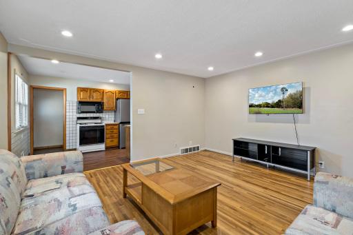 Another view of the living room, going to the eat-in kitchen.
