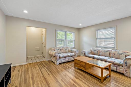 Once inside 5749 your are welcomed to a 15 x 14 living room with original hardwood floors.