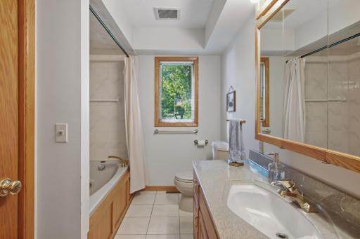 main level full bath ~ deep soaking jet tub