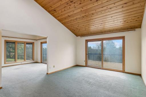 Primary bedroom with sliding glass doors to deck