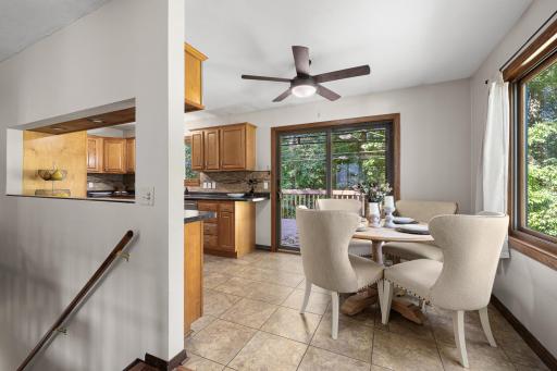 Dining room between deck, kitchen, and living room