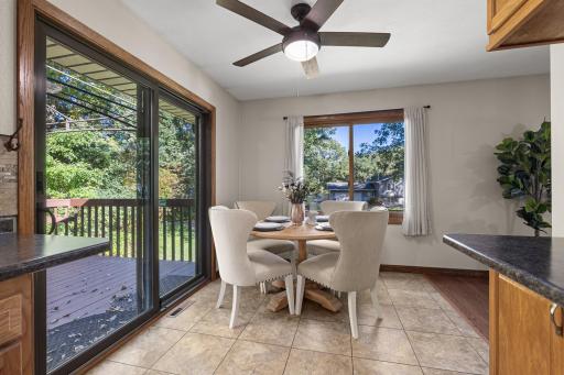 Dining room between deck, kitchen, and living room