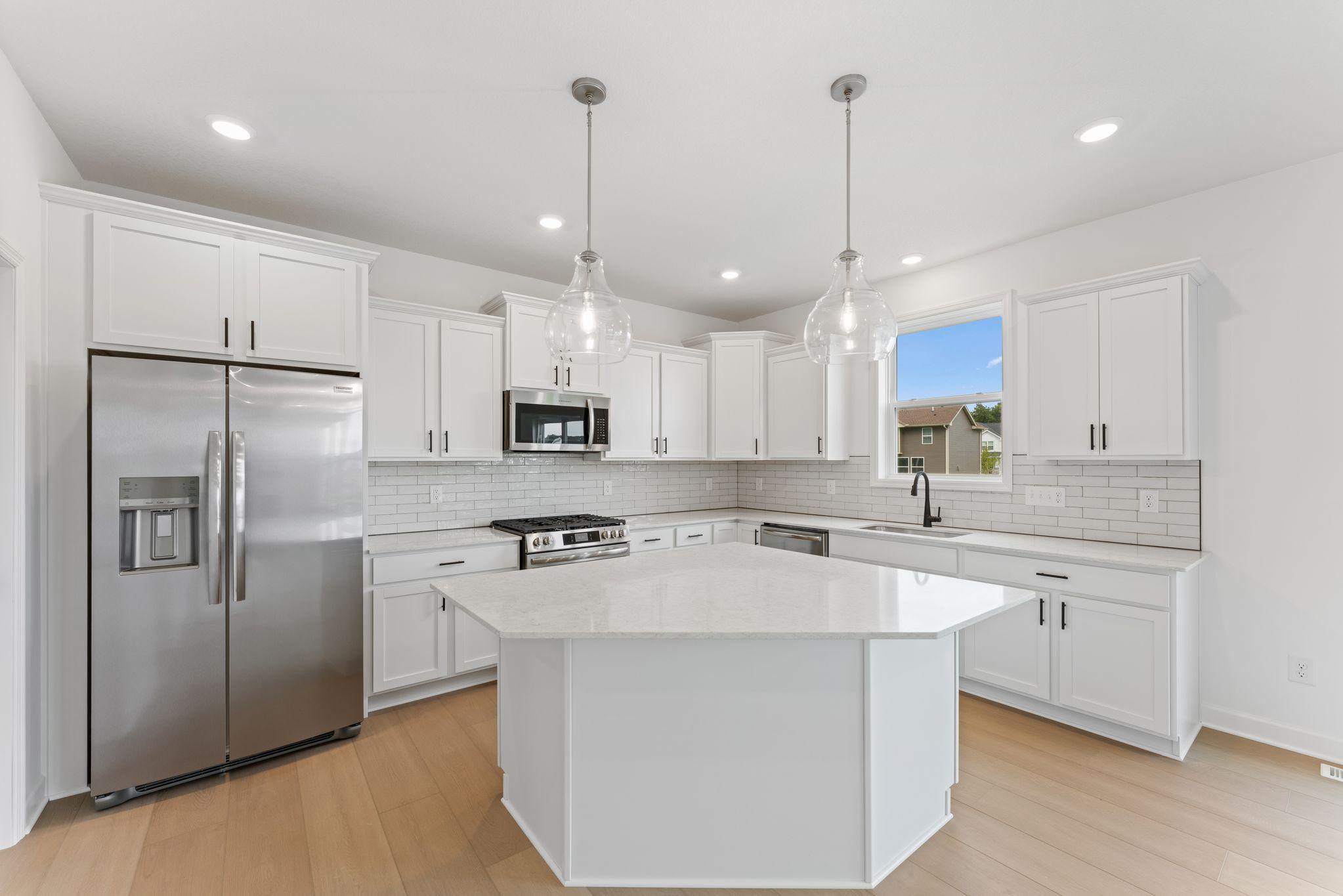 The kitchen naturally operates as the heart of this home, offering ample countertop space and brand-new appliances that will inspire attempts at new recipes.