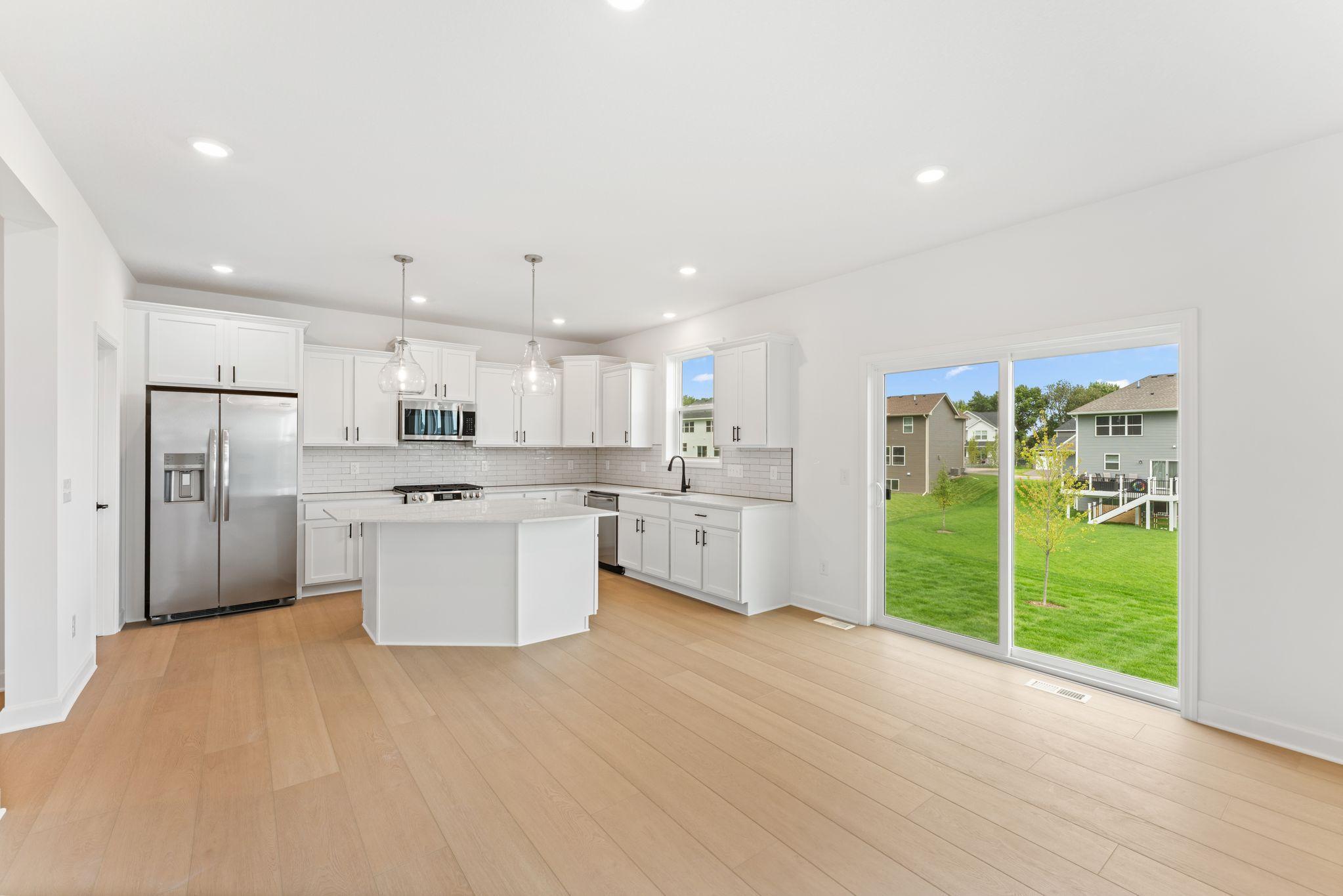 Enjoy meals of any kind in the dining room, situated among the open floorplan for effortless flow between cooking, dining and relaxing.