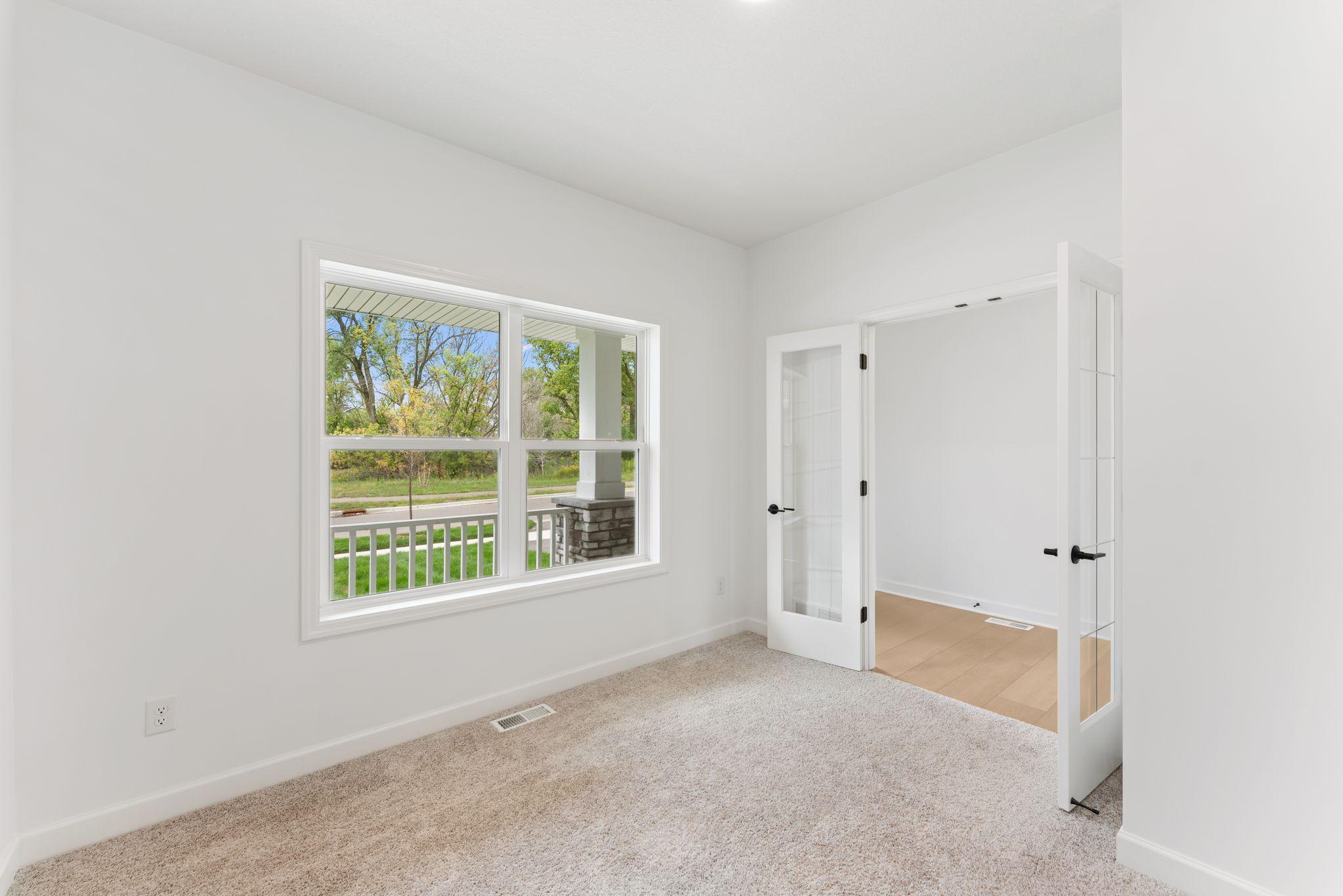 A first-floor office is situated just off the entry, ideal for working remotely or getting paperwork done.
