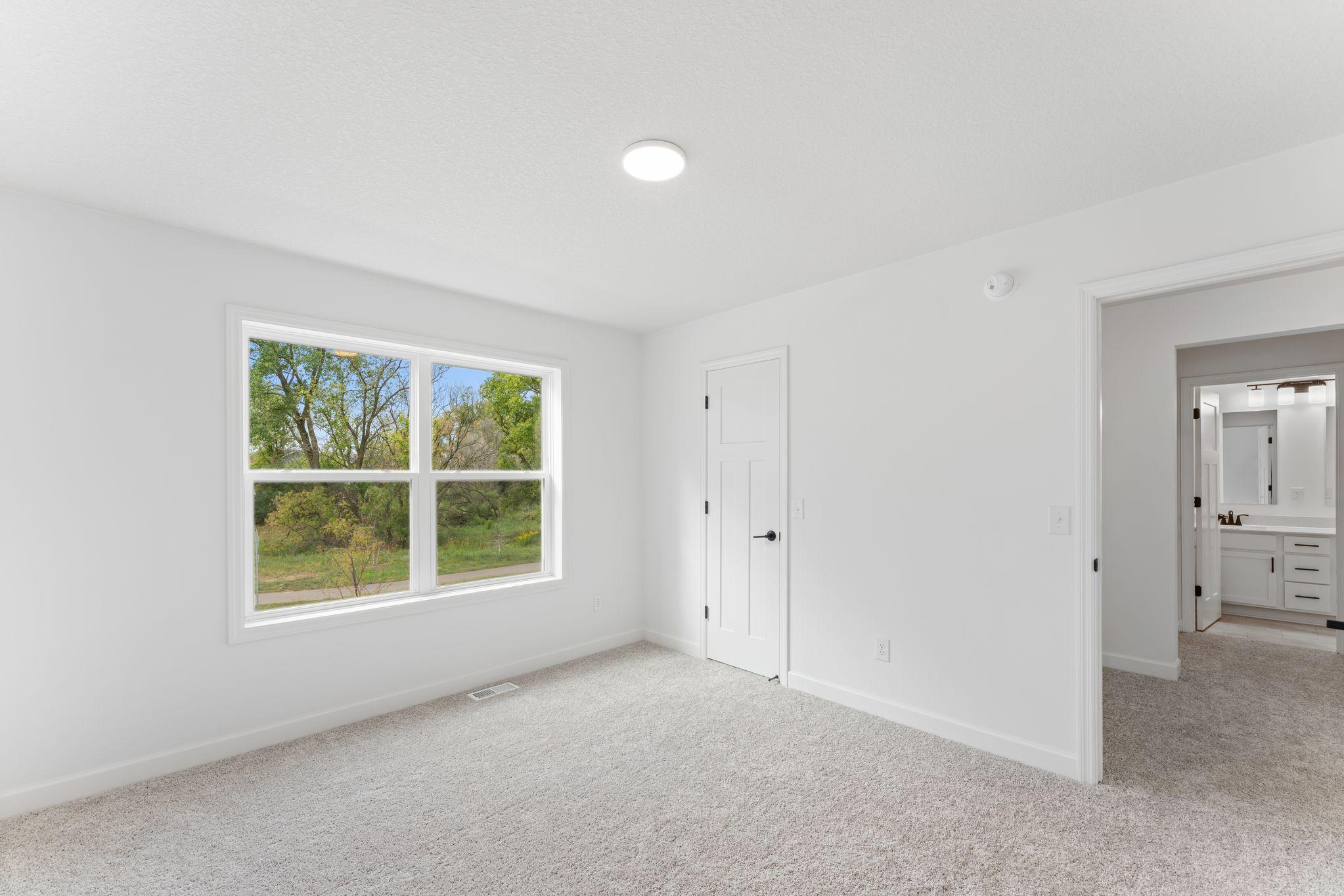 The secondary bedrooms provide spacious and private retreats for household members or overnight guests.