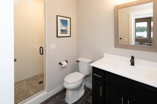 The lower level bathroom is perfect for when you come in from the lake.