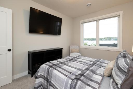 Bedroom 4 - located in the lower level with views of the lake.