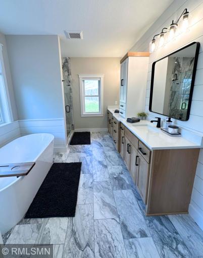 Primary Bathroom w/ Soaking Tub and Walk-in Shower