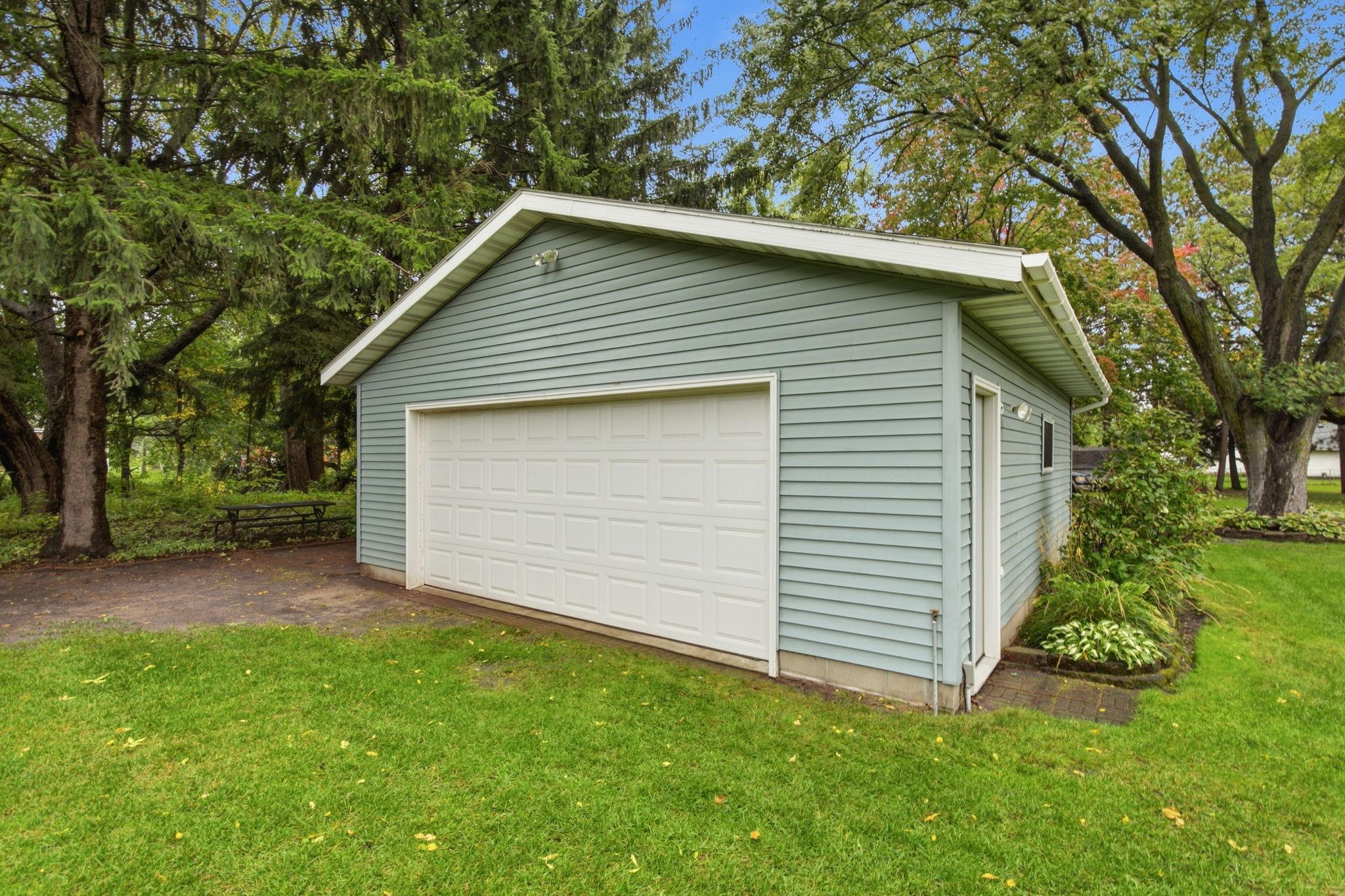 24x24 detached garage with concrete floor and power