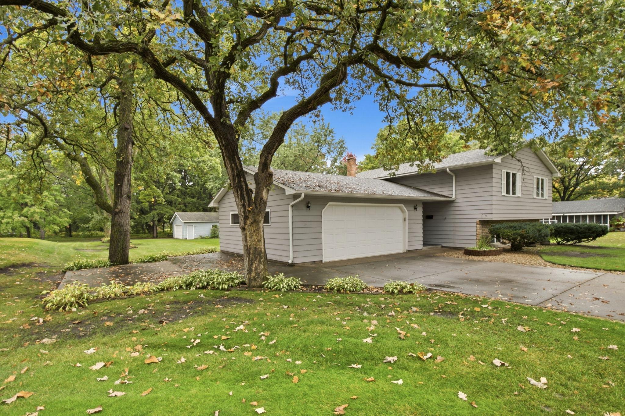 Almost 1/2 Acre lot, 2 car attached garage and 2 stall detached garage