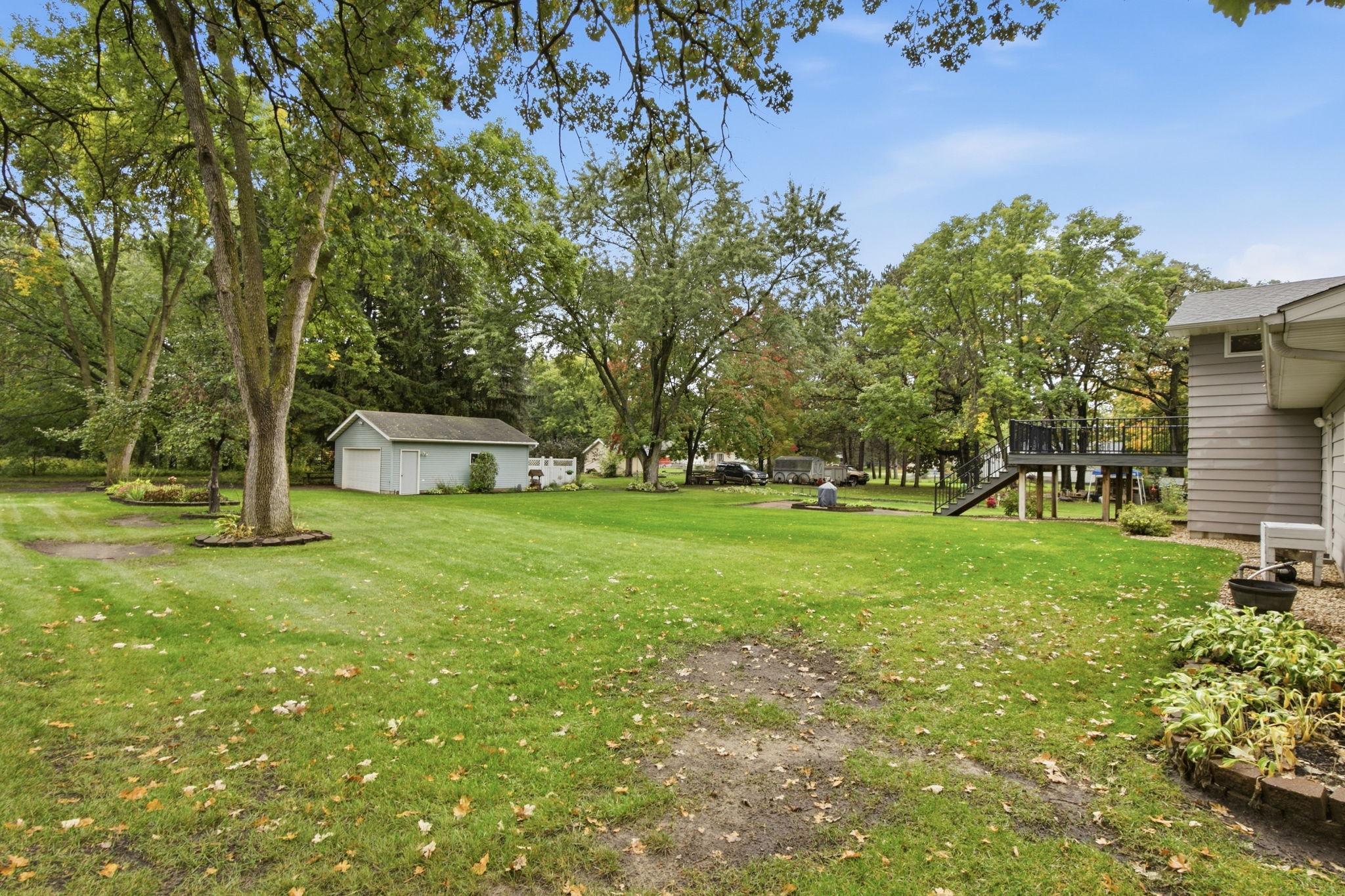 level lot with surrounding mature trees