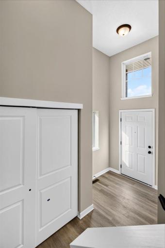 Foyer. Photo taken of another home with similar plan and finishes.