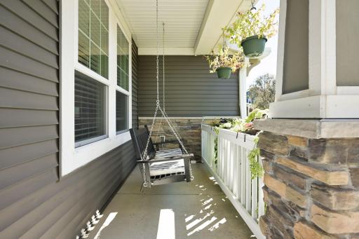 The front porch is a great place to enjoy your morning coffee or unwind in the evening.