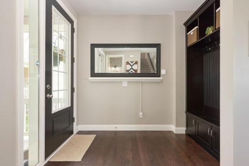 Welcoming Front Entry with convenient custom cabinets