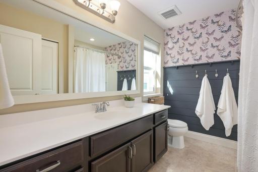 Upper-level Full Bathroom with custom finishes