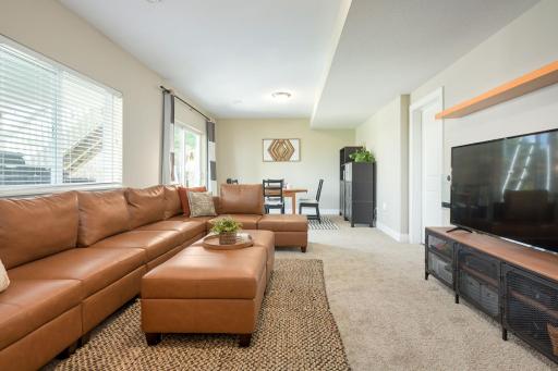The walkout and wall of windows offer great natural light!