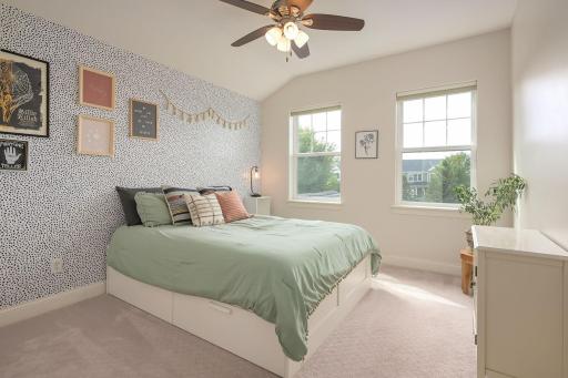 4 spacious Bedrooms on the upper-level feature ceiling fans and plenty of light!