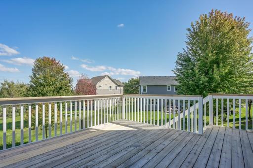 Spacious deck overlooking the spacious and private backyard