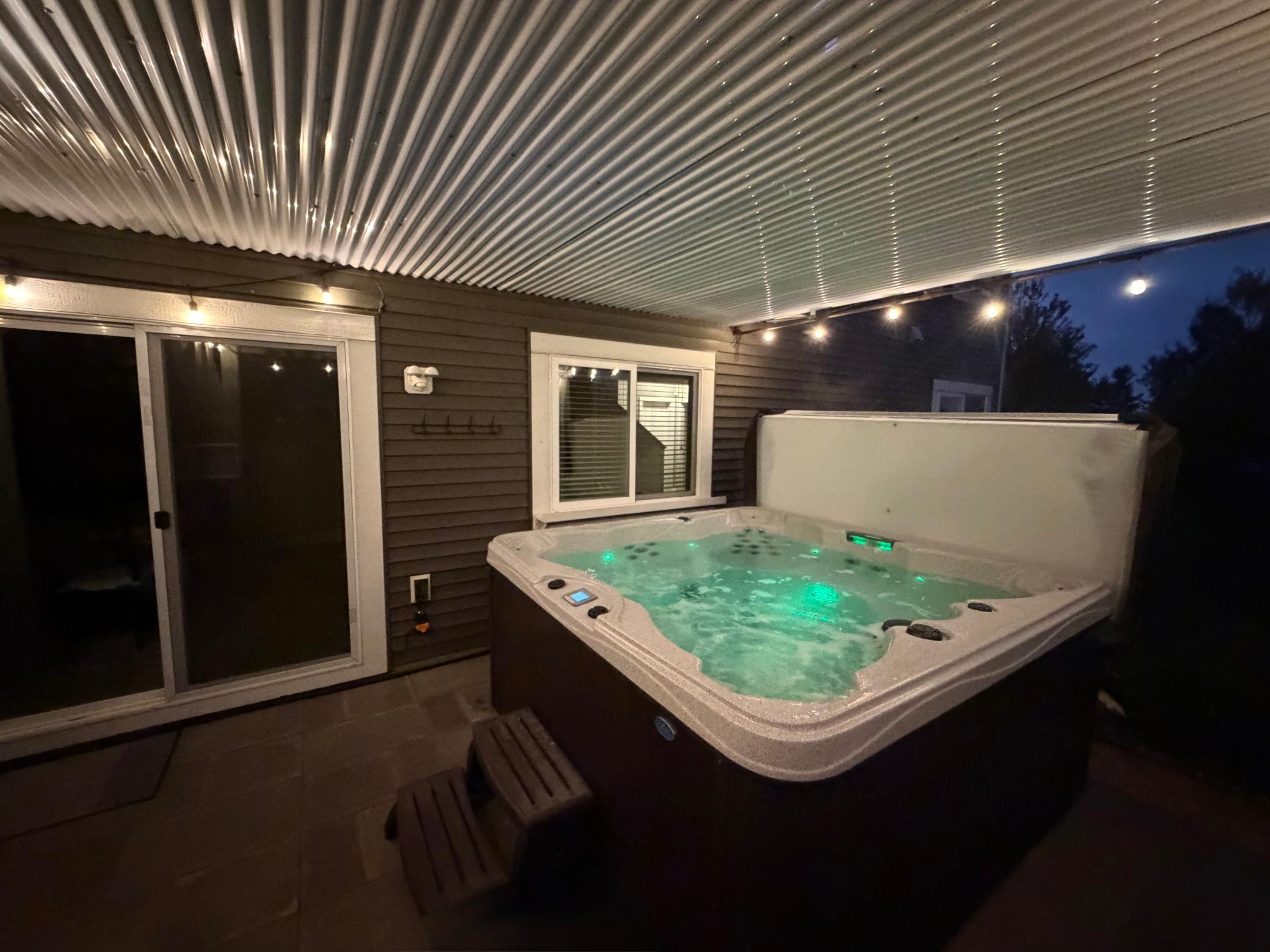 Walk out to your private hot tub!