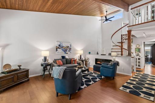 Living room with custom electric fireplace with color changing feature