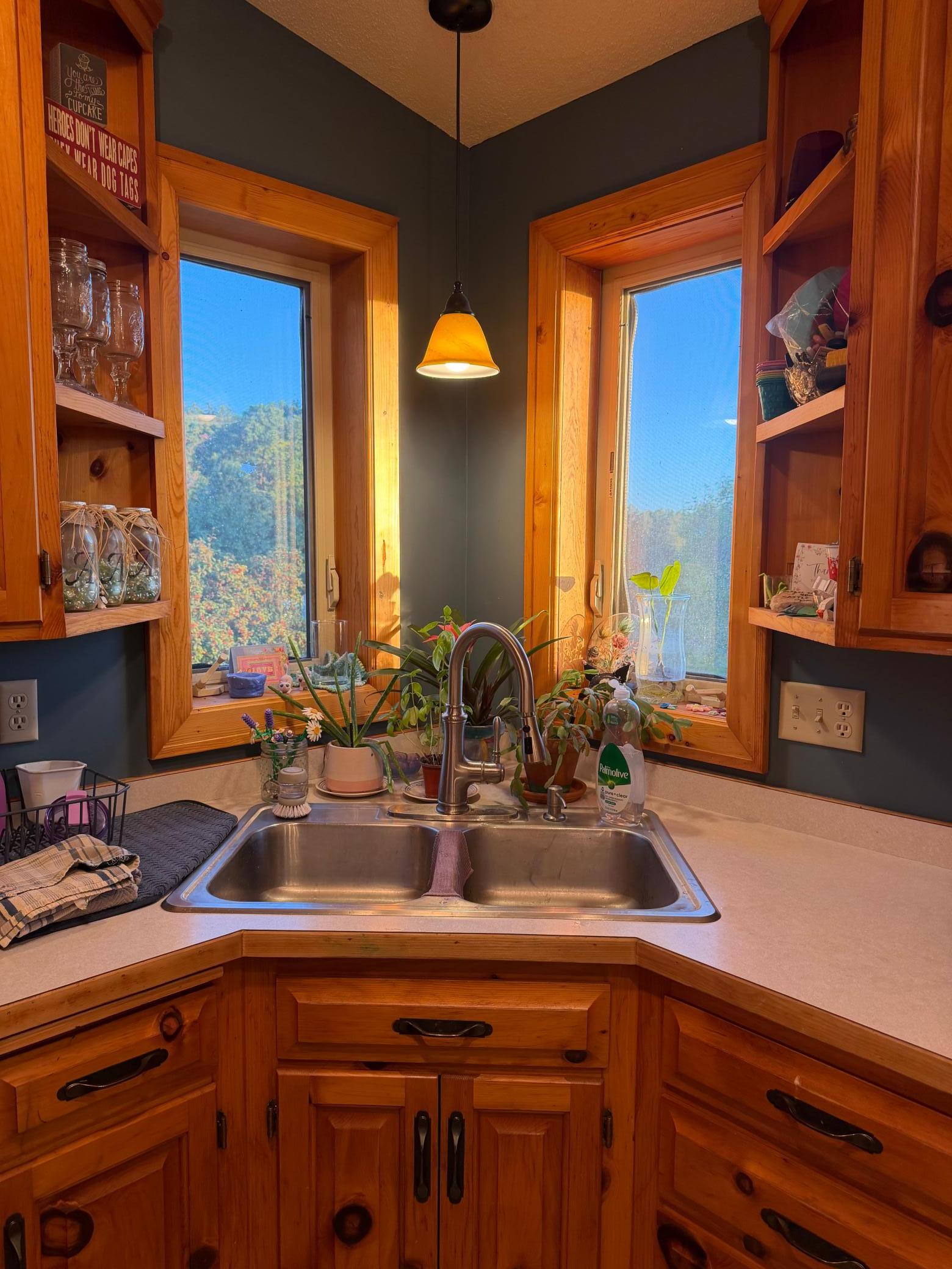 Corner sink allows for sunlight from the east and south