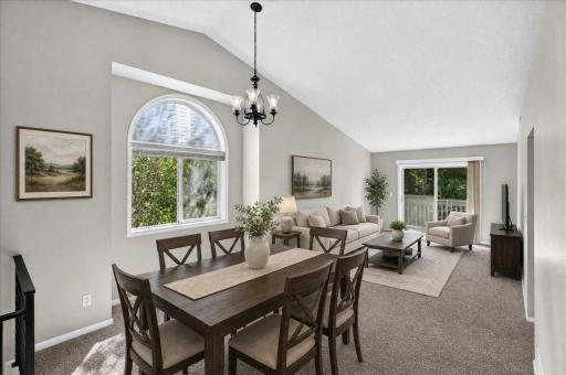 Vaulted Living and Dining Room staged virtually