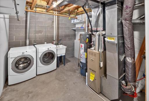 Large Lower Laundry with Mechanical and storage solutions